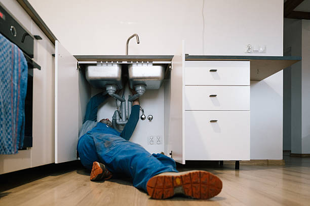 Professional Drain Cleaning technician working in Waterloo, IA